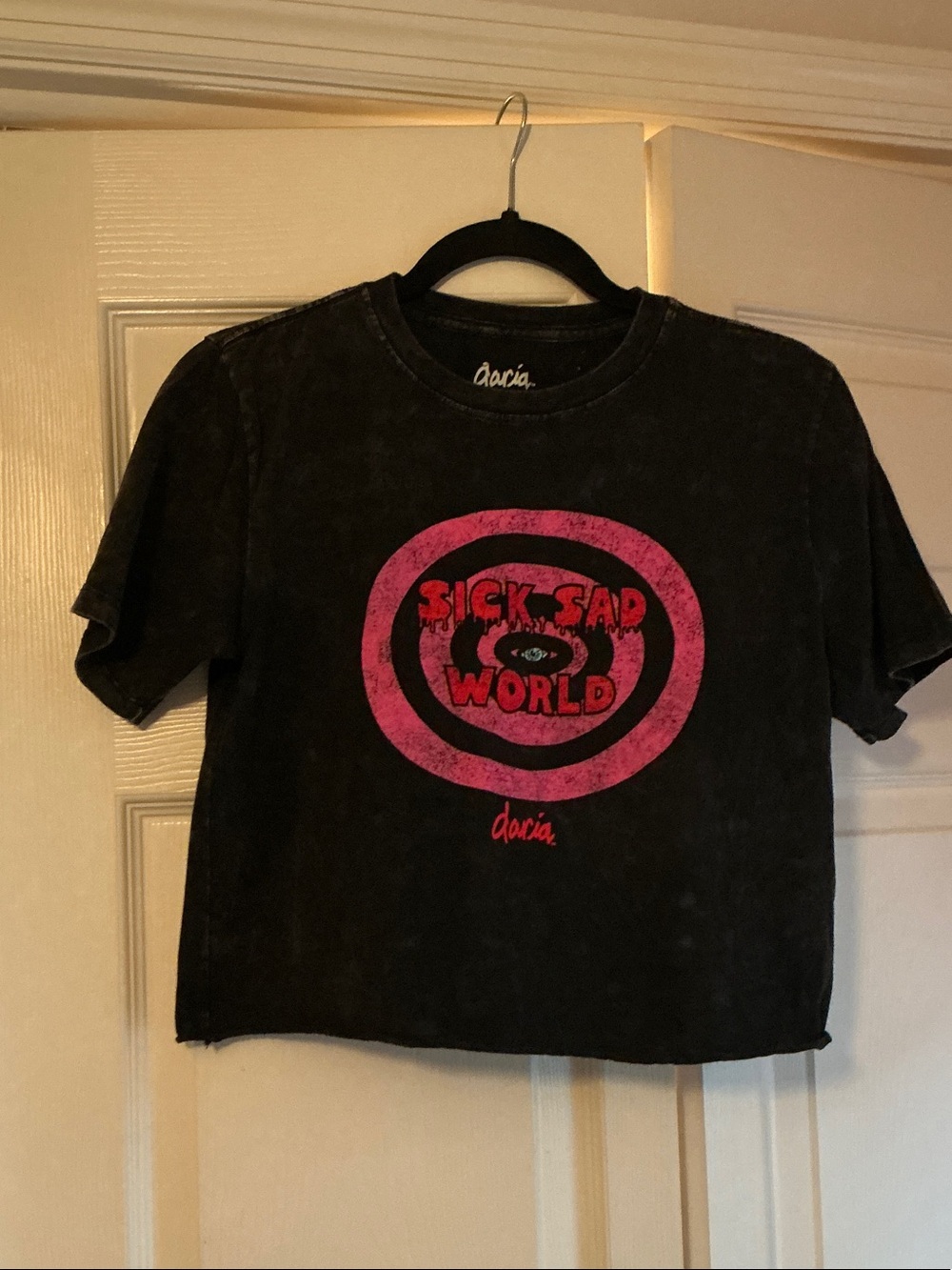 Aria Black Crop Tee with Pink 'Sick Sad World' Graphic